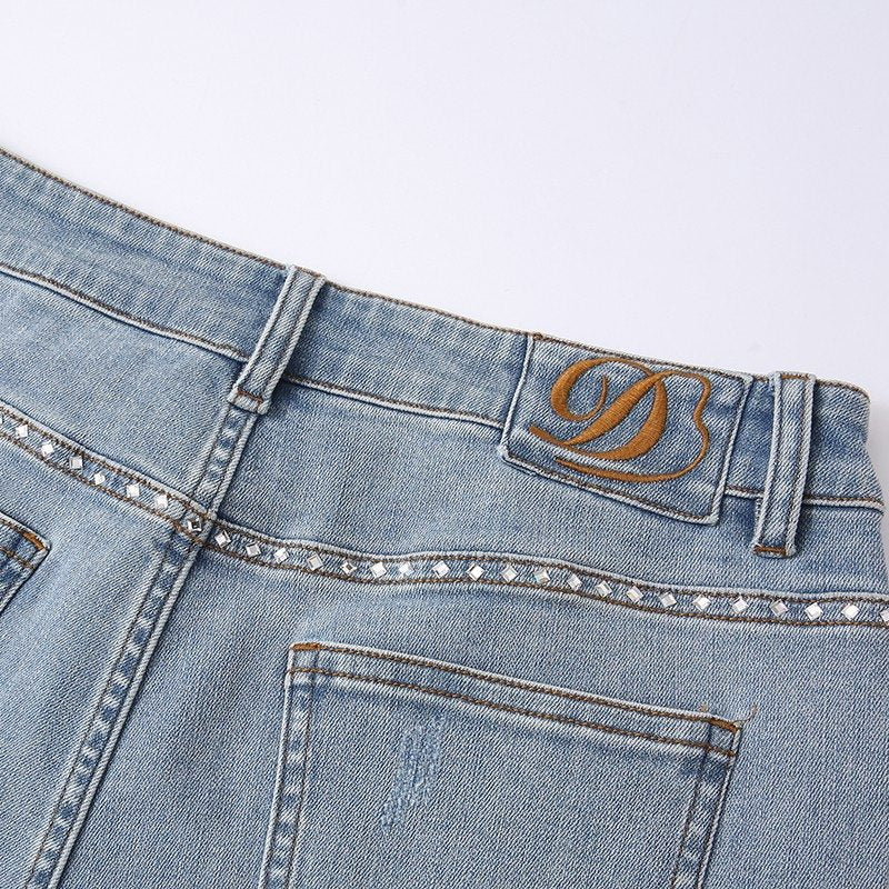 RHINESTONE FLARED DENIM PANTS